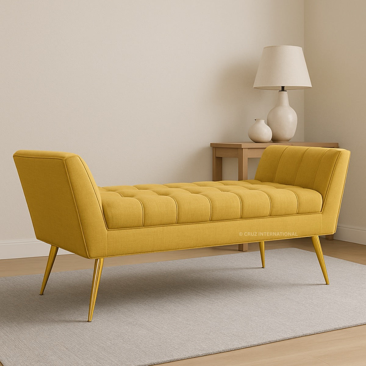Yellow bench in a room with a side table and lamp.